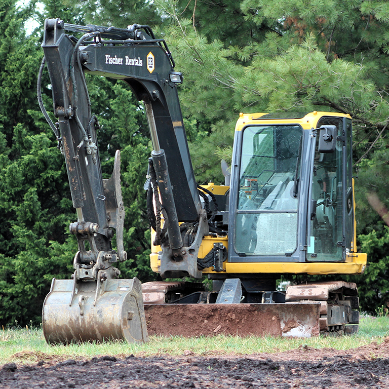 Mini Excavator with auger attachment